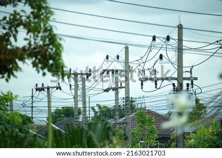 Similar – Foto Bild Mast mit elektrischen Leitungen und Kabeln für den Transport von elektrischer Energie