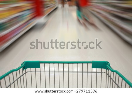 supermarket shopping cart in motion blur