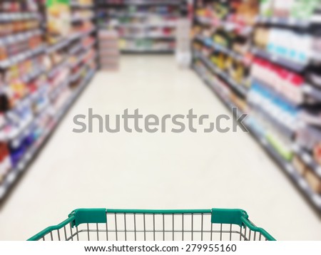 shopping cart supermarket aisle blur background