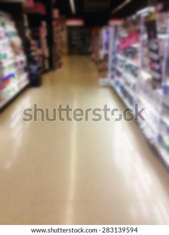 health and beauty shelves in supermarket blur background
