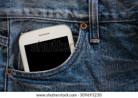 mobile phone in jeans pocket with black screen