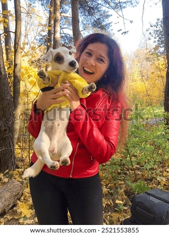 Similar – Foto Bild Frau mit Jack-Russell-Terrier-Welpen im Freien. Beziehungen und Tierpflegekonzept