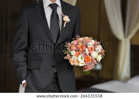 a man with a bouquet