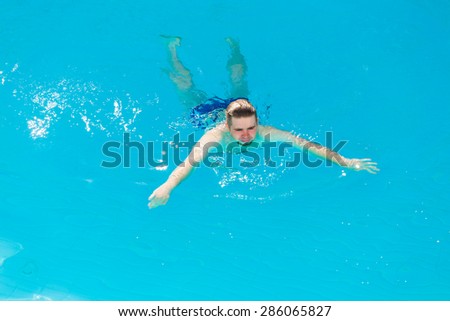 man swim  in the pool