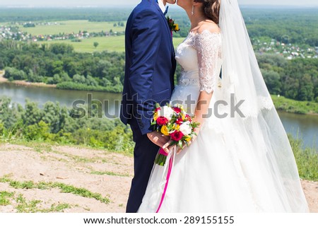 beautiful wedding couple on the country road