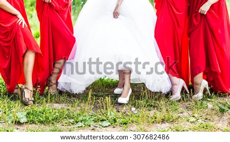 Row of bridesmaids  at wedding ceremony. Bride and bridesmaids