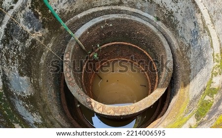 Similar – Image, Stock Photo Contaminated brown water in a pond in nature