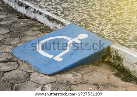 accessibility ramp for wheelchair users with accessibility symbol design Photo stock © 