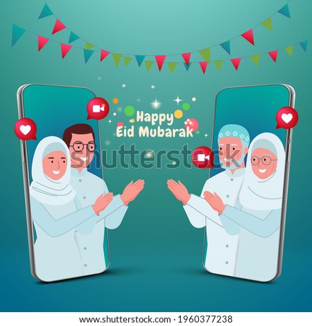 Selamat hari raya Idul Fitri or is another language of happy eid mubarak in Indonesian. muslim family blessing Eid mubarak with smart phone screens using video call during Covid-19