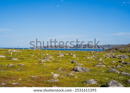 Similar – Image, Stock Photo Rough rocks in blue ocean under sunste sky