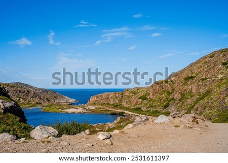 Similar – Image, Stock Photo Rough rocks in blue ocean under sunste sky