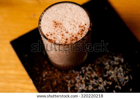 lavender hot cocoa drink on concrete background cool shadows natural light background