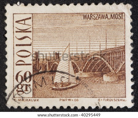 WARSAW, POLAND - 1974: Postal stamp Poland 1974. Vintage stamp which represents a yacht and bridge, circa 1974