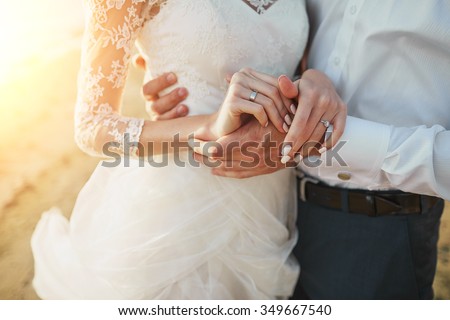 Just married couple running on a sandy beach Stock foto © 