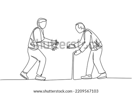 An elderly and a young man walked side by side while preparing to embrace. old man holding a stick. The young man extended his hand towards the old man. son and father meet after long time no see.