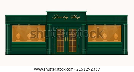 Boutique shop store. Facade of a jewelry store with a showcase green color. Store building
