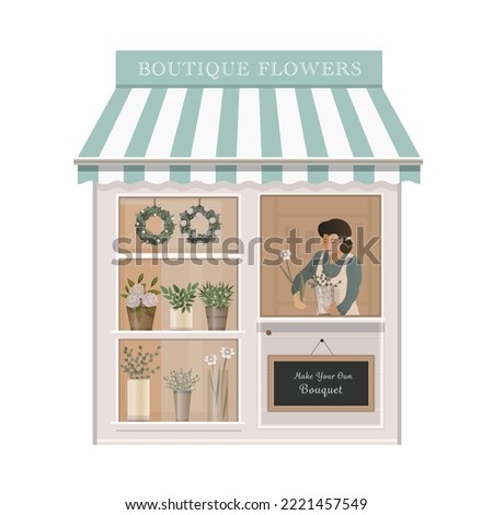 A flower shop with a florist girl and a showcase on which there are different bouquets. Vintage flower boutique with showcase. Florist makes a bouquet