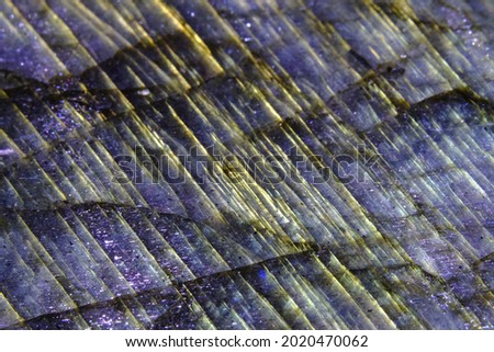 Irisation under the surface of labradorite. Irisation is an optical effect, an iridescent glow with a different color spectrum. Photo stock © 