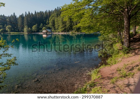 Emerald reflections on the lower lake in Fusine - Friuli