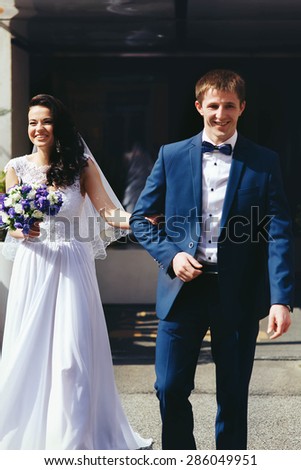 wedding ceremony of  beautiful young gorgeous stylish brunette bride and groom tivoli italy