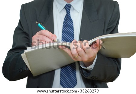 Businessman writing in the file folder isolated on white background