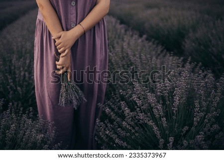 Image, Stock Photo Woman with lavender flowers near the purple minivan
