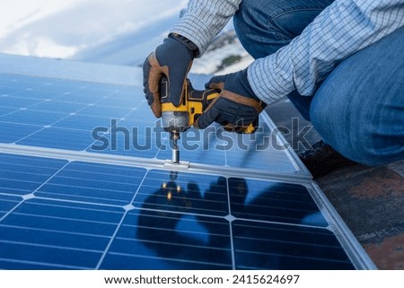 Similar – Foto Bild Unerkennbarer Ingenieur am Solarpanel