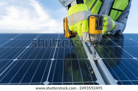 Similar – Foto Bild Unerkennbarer Ingenieur am Solarpanel