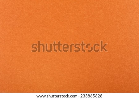 Orange flat cardboard texture abstract, paper plain grainy smooth surface background in horizontal orientation, nobody.