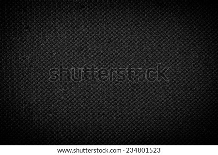 Black flax cloth texture abstract, gloomy plain seamless surface with dark vignette background in horizontal orientation, nobody.