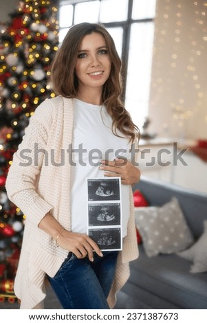 Similar – Image, Stock Photo Pregnant woman with sonogram picture on shore