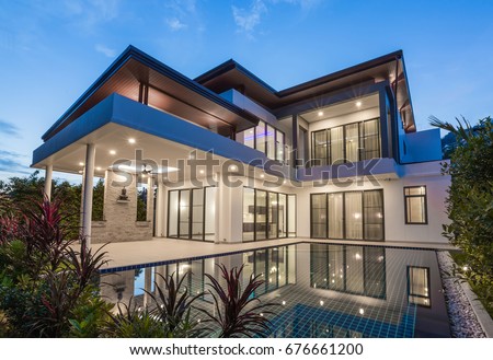 Similar – Image, Stock Photo Windows of a modern building and blooming tree