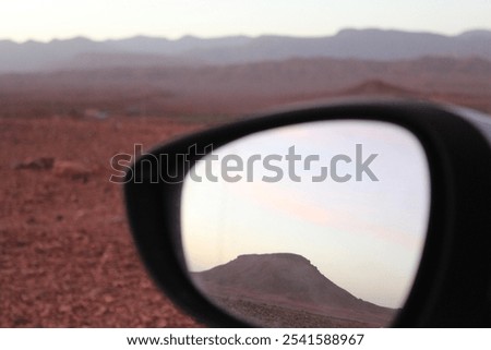 Similar – Image, Stock Photo Dark mountain range under cloudy sky in twilight