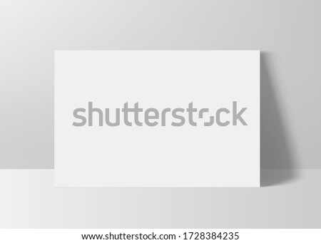 Horizontal rectangle A4 paper format mock up. Sheet of paper landscape orientation 3d realistic mockup with shadow. Empty white poster template. Vector illustration.