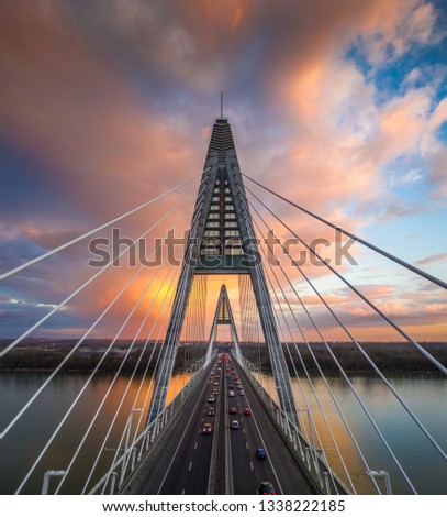 Similar – Image, Stock Photo Large bridge over river with cars traffic