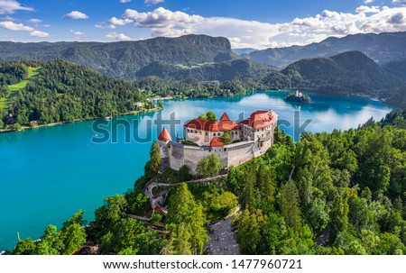 Similar – Image, Stock Photo Lake Bled and island with church and castle on the rock in the background in summer, Slovenia, Europe