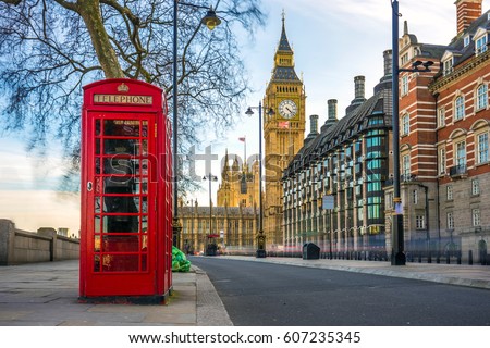 London, England - The iconic british old red telephone box with the Big Ben at background in the center of London ストックフォト © 