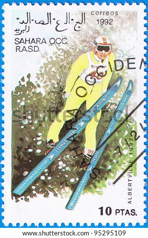 WESTERN SAHARA - CIRCA 1992: A stamp printed in Western Sahara shows jumps from a springboard, series devoted Olympic Games in Albertville, circa 1992