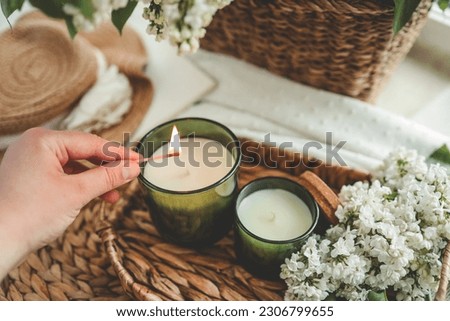 Similar – Image, Stock Photo Woman holding a candle at night, during the Easter celebrations