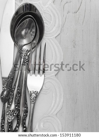 utensils on the wooden background with place for the text