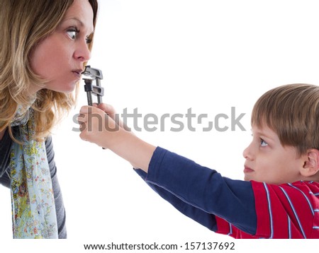 Naughty child does not allow his nervous mother to talk - young rebel