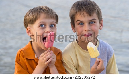 happy brothers with ice cream
