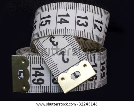 measuring tape isolated on black