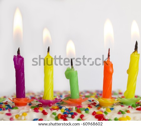 burning candles on the cake