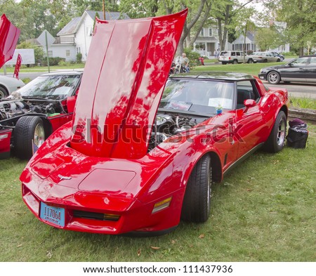 WAUPACA, WI - AUGUST 25: Red 1980 Chevy Corvette car at the 10th Annual Waupaca Rod & Classic Car Club Car Show on August 25, 2012 in Waupaca, Wisconsin.