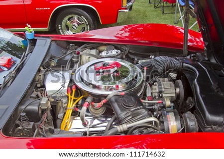 WAUPACA, WI - AUGUST 25: Engine of a red 1980 Chevy Corvette car at the 10th Annual Waupaca Rod & Classic Car Club Car Show on August 25, 2012 in Waupaca, Wisconsin.