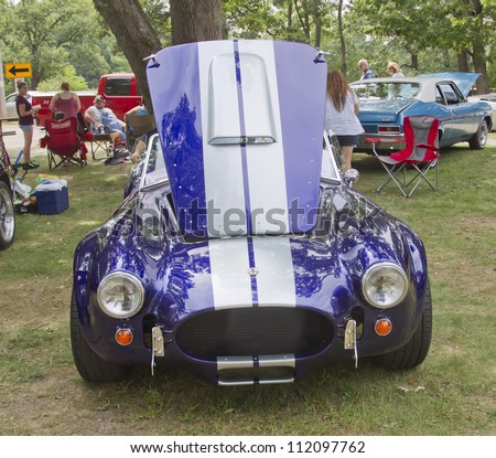 WAUPACA, WI - AUGUST 25:  Front view of Purple & White 1965 Ford Shelby Cobra car at the 10th Annual Waupaca Rod & Classic Car Club Car Show on August 25, 2012 in Waupaca, Wisconsin.