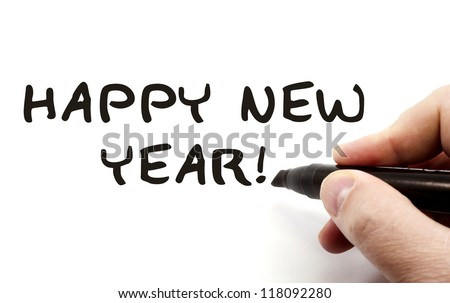 Happy New Year being written with a hand and black felt pen