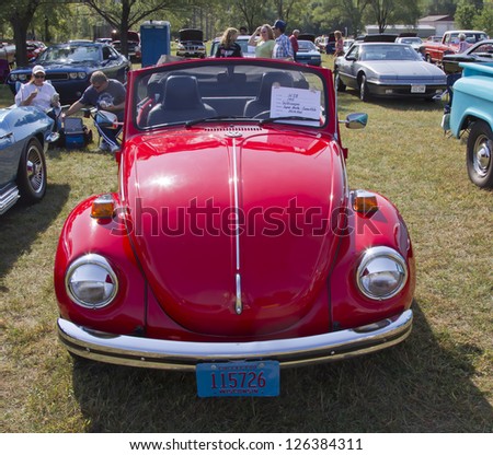 MARION, WI - SEPTEMBER 16: 1971 Red VW Super Beetle bug car at the 3rd Annual Not Just Another Car Show on September 16, 2012 in Marion, Wisconsin.