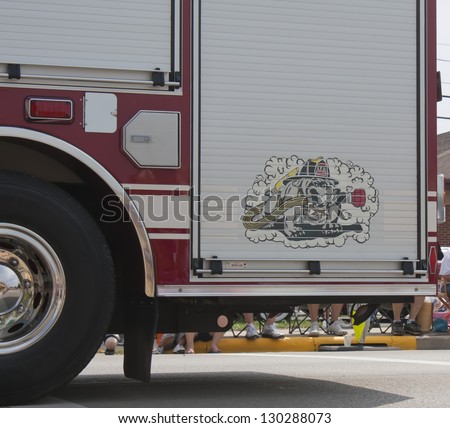 SEYMOUR, WI - AUGUST 4:  Dog in Firehose design on an Engine Truck at the Annual Hamburger Festival Parade on August 4, 2012 in Seymour, Wisconsin.